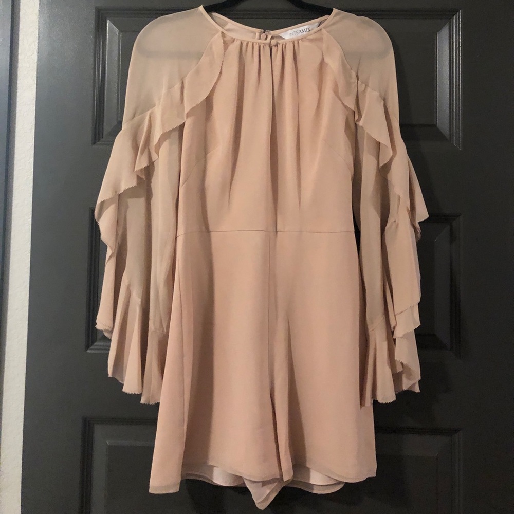 Blush ruffled romper